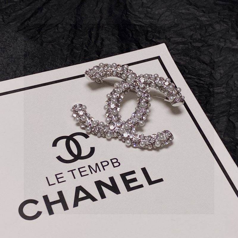 Ch**el brooches